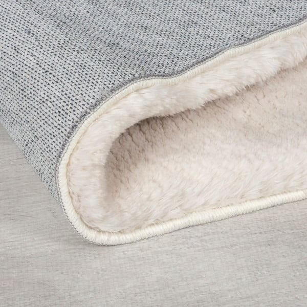 Krēmkrāsas sintētiska kažokāda 160x230 cm Faroe Wool Look Fur – Flair Rugs-image-2