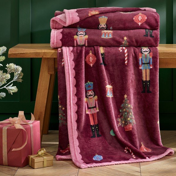 Bordo/rozā pleds ar Ziemassvētku motīvu 170x130 cm Christmas Nutcracker – Catherine Lansfield-image-1