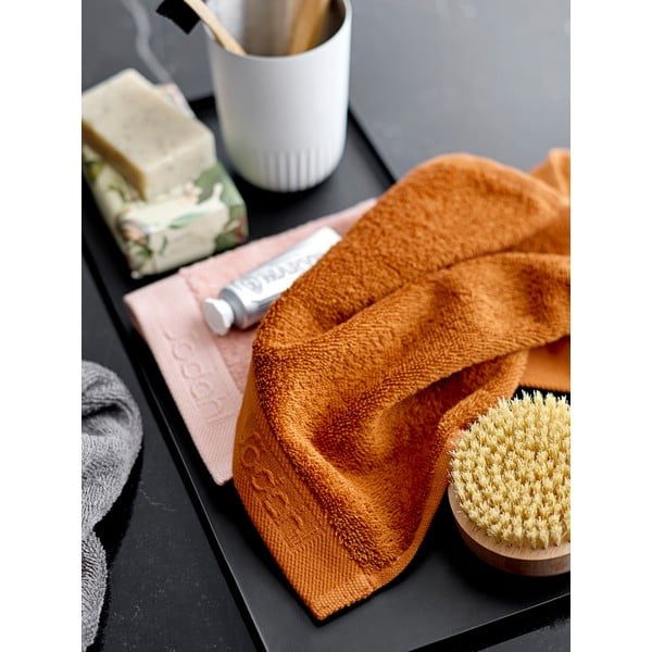 Oranžs frotē kokvilnas dvielis Södahl Clay, 100 x 50 cm-image-1