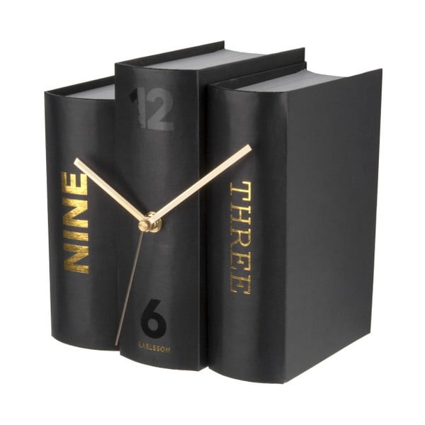 Melns galda pulkstenis grāmatu Karlsona formā