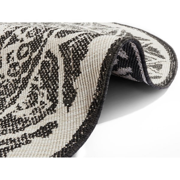 Melns un krēmkrāsas āra paklājs NORTHRUGS Siruma, ø 200 cm-image-2