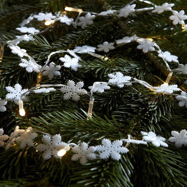 Caurspīdīga LED gaismiņu virtene sniegpārslu formā Markslöjd Snöstjarna, 20 gaismiņas, garums 220 cm