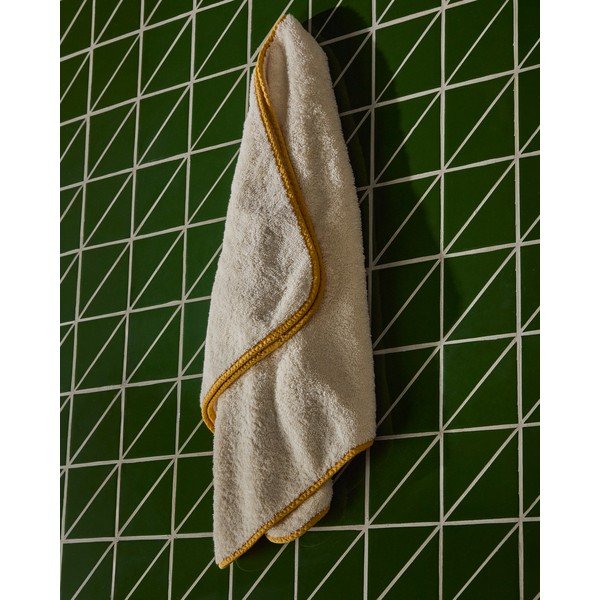 Dzeltens/balts frotē kokvilnas dvielis 50x90 cm Sedora – Kave Home-image-1