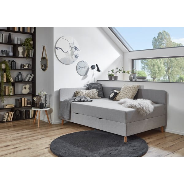 Gaiši pelēka mīksta vienvietīga gulta ar uzglabāšanas vietu 90x200 cm Cabana – Meise Möbel-image-1