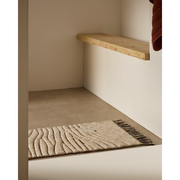 Bēšs vannas istabas paklājiņš 50x70 cm Crilda – Kave Home-image-1