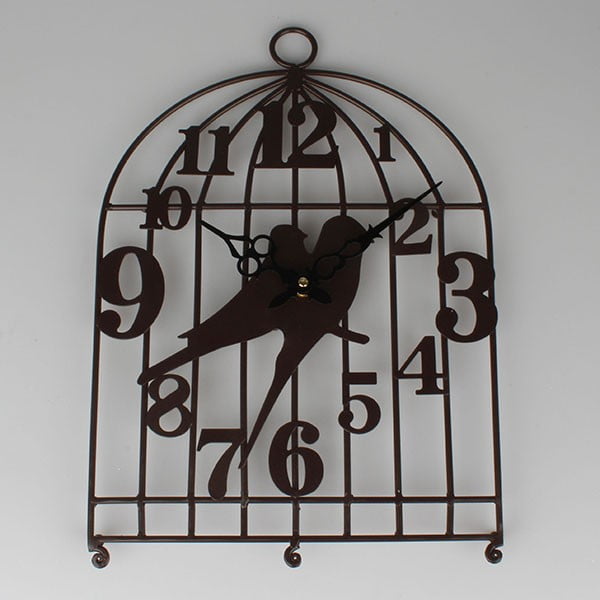 Melns pulkstenis Dakls putnu būris