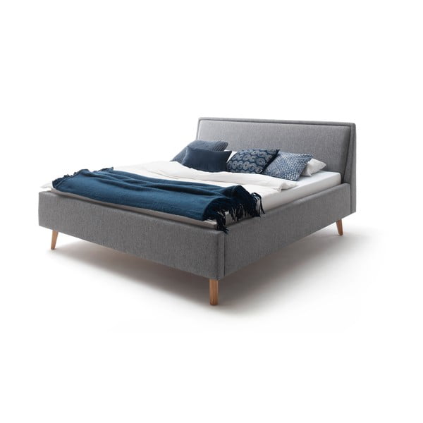 Gaiši pelēka mīksta divvietīga gulta ar uzglabāšanas vietu un režģi 180x200 cm Frieda – Meise Möbel